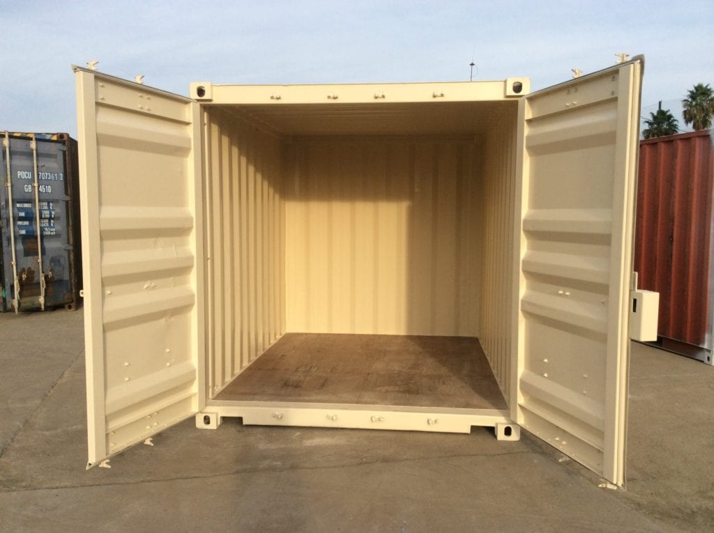 Clean interior view of a 10 ft portable shipping container showing wooden floor