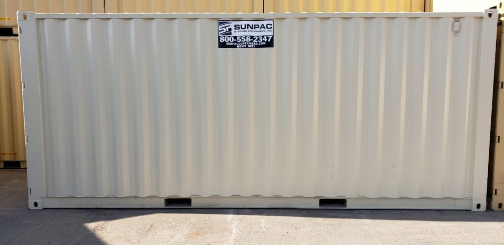 Profile view of a 20 ft shipping container placed on a concrete site